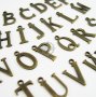 1set 15x10mm vintage kawaii metal 26 alphabet letter bronze brass pendant charm packs assortment 1810055